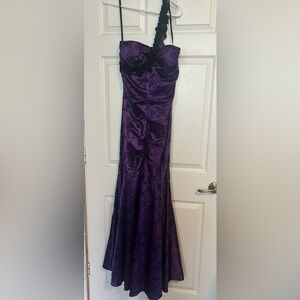 Purple one shoulder gown